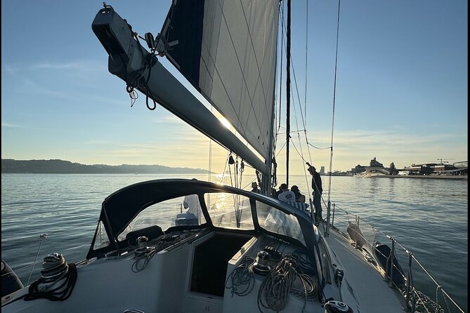 Sunset sailboat tour in Lisbon with green wine - Cristo Rei and the bridge passage: watching Lisbon’s angle change