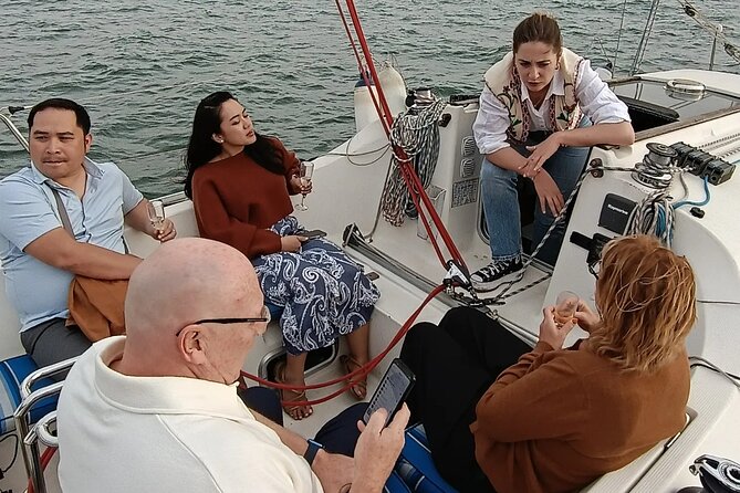 Sunset sailing boat trip in Lisbon with snacks - Crew vibe matters: Paulo and Monica’s attentive style