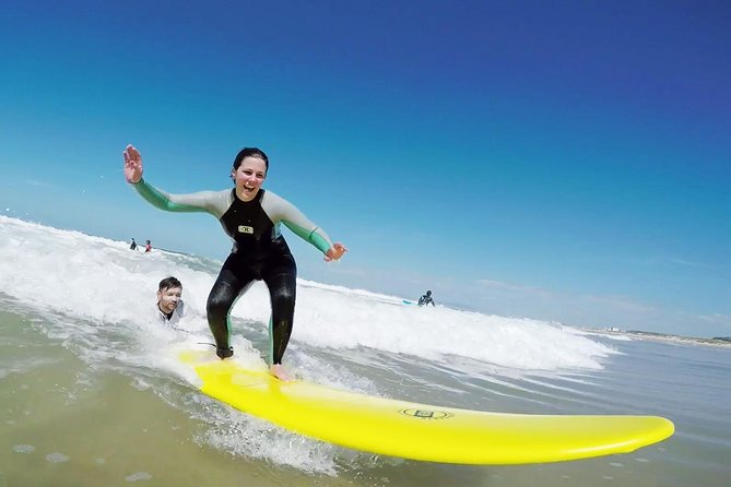 Surf Class in Almada - Getting Suited Up: Wetsuit + Board and the Warm-Up that Actually Helps