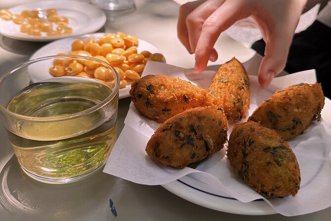 The Portuguese Food Tour – Dishes, Drinks & Sights - Bica Funicular storytelling: how Lisbon’s neighborhoods connect