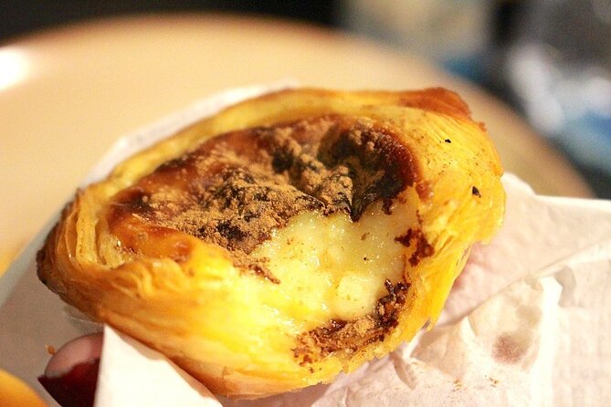 The Portuguese Food Tour – Dishes, Drinks & Sights - Castelo de São Jorge finish: the hilltop trick and the pastel de nata finale