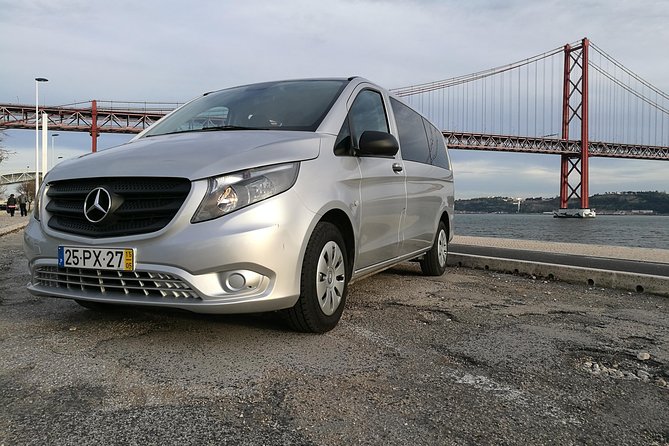 Transfer Tour Lisbon/Porto with 2 stops options Óbidos, Nazaré, Fátima, Coimbra - Comfort extras: WiFi, bottled water, and a private setup