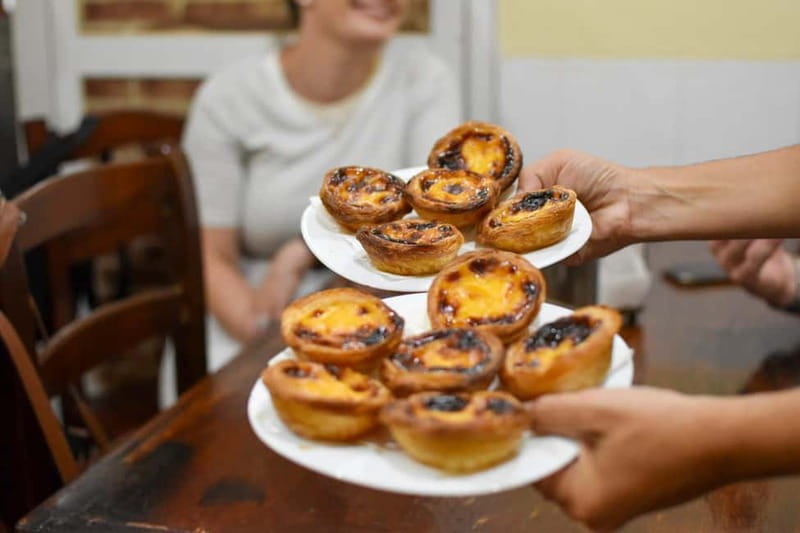 Treasures of Lisboa : Alfama Food Tour with 18 Tastings - Miradouro das Portas do Sol: a scenic warm-up before the first bites