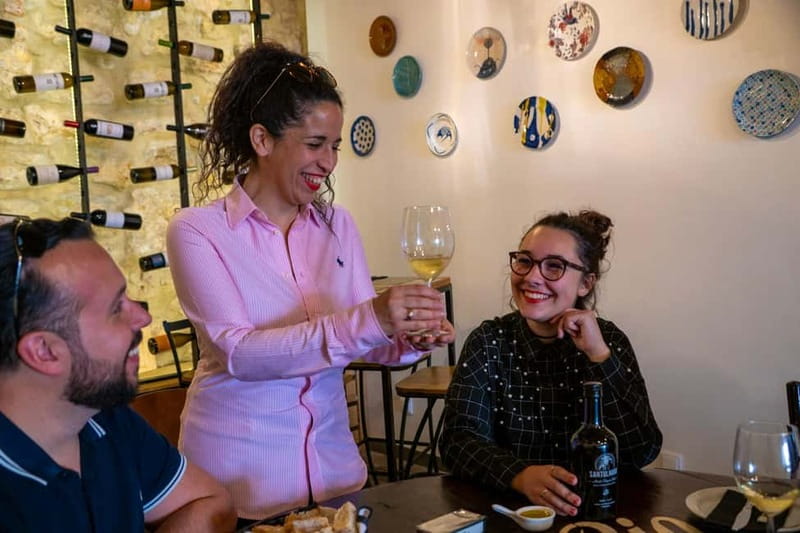 Treasures of Lisboa : Alfama Food Tour with 18 Tastings - Finding the group: Largo das Portas do Sol, behind the St Vincente statue