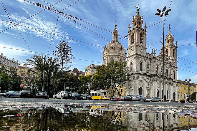 Tuk tuk experience through the historic neighborhood of Alfama - Lisbon Cathedral: stepping inside a mix of styles