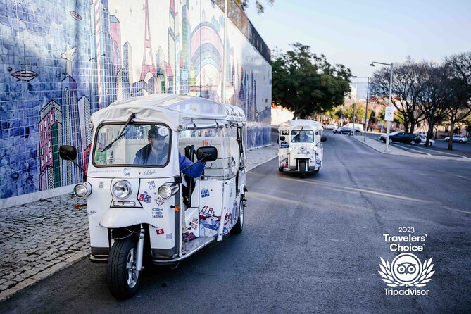 Welcome Lisbon Tour with Local Guide in Private Eco Tuk Tuk - Chiado: elegant Lisbon, big landmarks, and a bookstore that still works